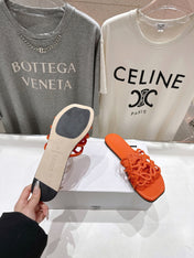 LOEWE 26S PETAL ANAGRAM SLIDE IN BURNT ORANGE CALFSKIN