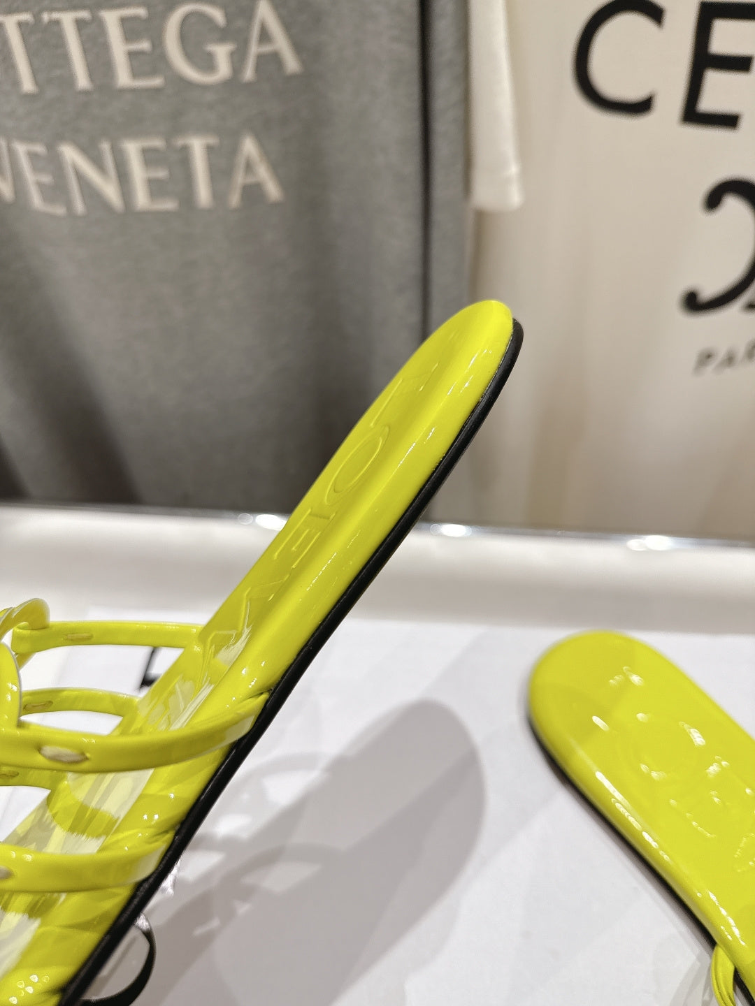 LOEWE 26S PETAL ANAGRAM SLIDE IN LEMON YELLOW CALFSKIN