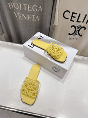 LOEWE 26S PETAL ANAGRAM SLIDE IN YELLOW CALFSKIN