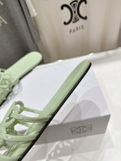 LOEWE 26S PETAL ANAGRAM SLIDE IN SAGE GREEN CALFSKIN