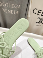 LOEWE 26S PETAL ANAGRAM SLIDE IN SAGE GREEN CALFSKIN