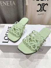 LOEWE 26S PETAL ANAGRAM SLIDE IN SAGE GREEN CALFSKIN