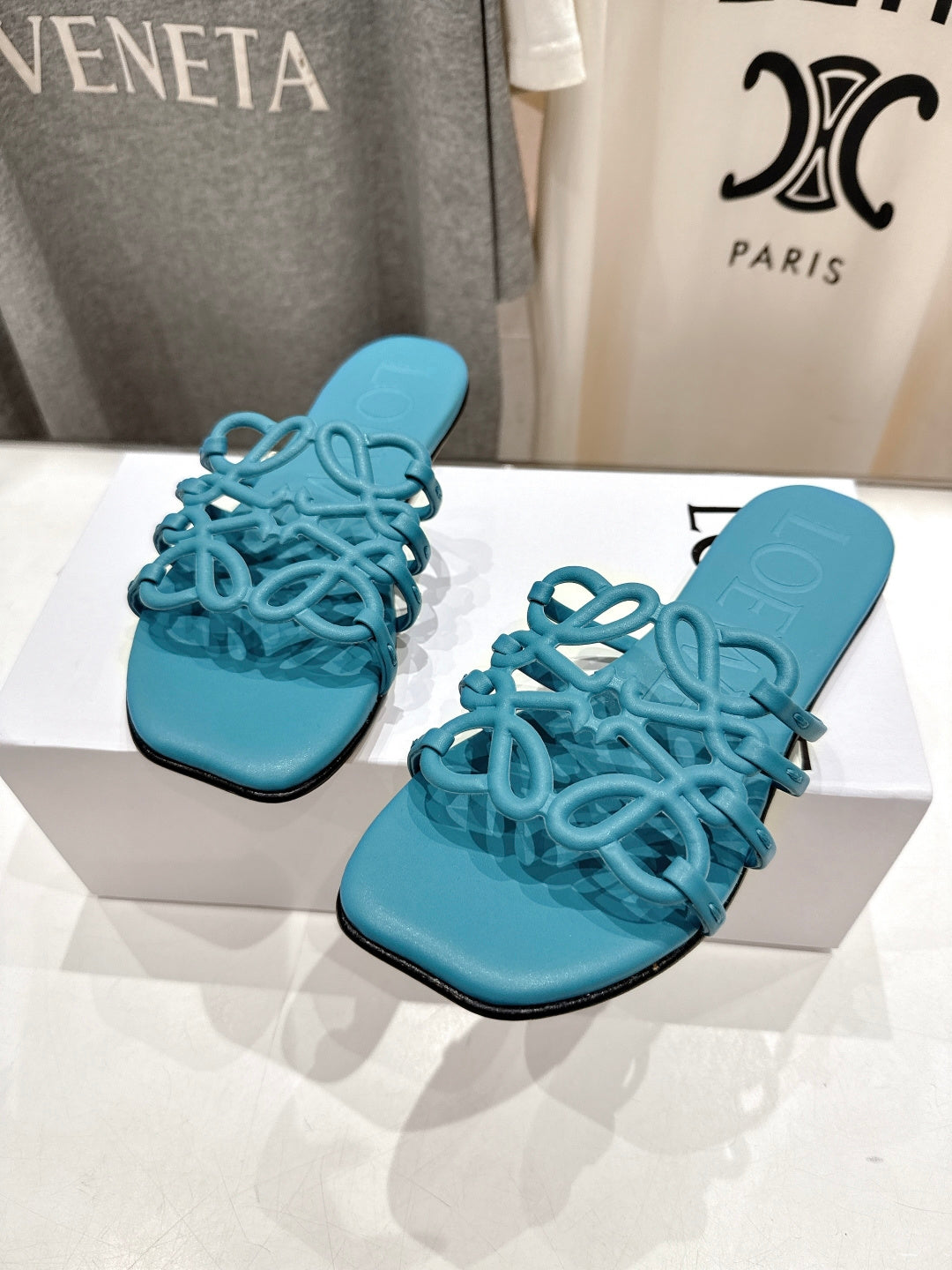 LOEWE 26S PETAL ANAGRAM SLIDE IN TEAL BLUE CALFSKIN
