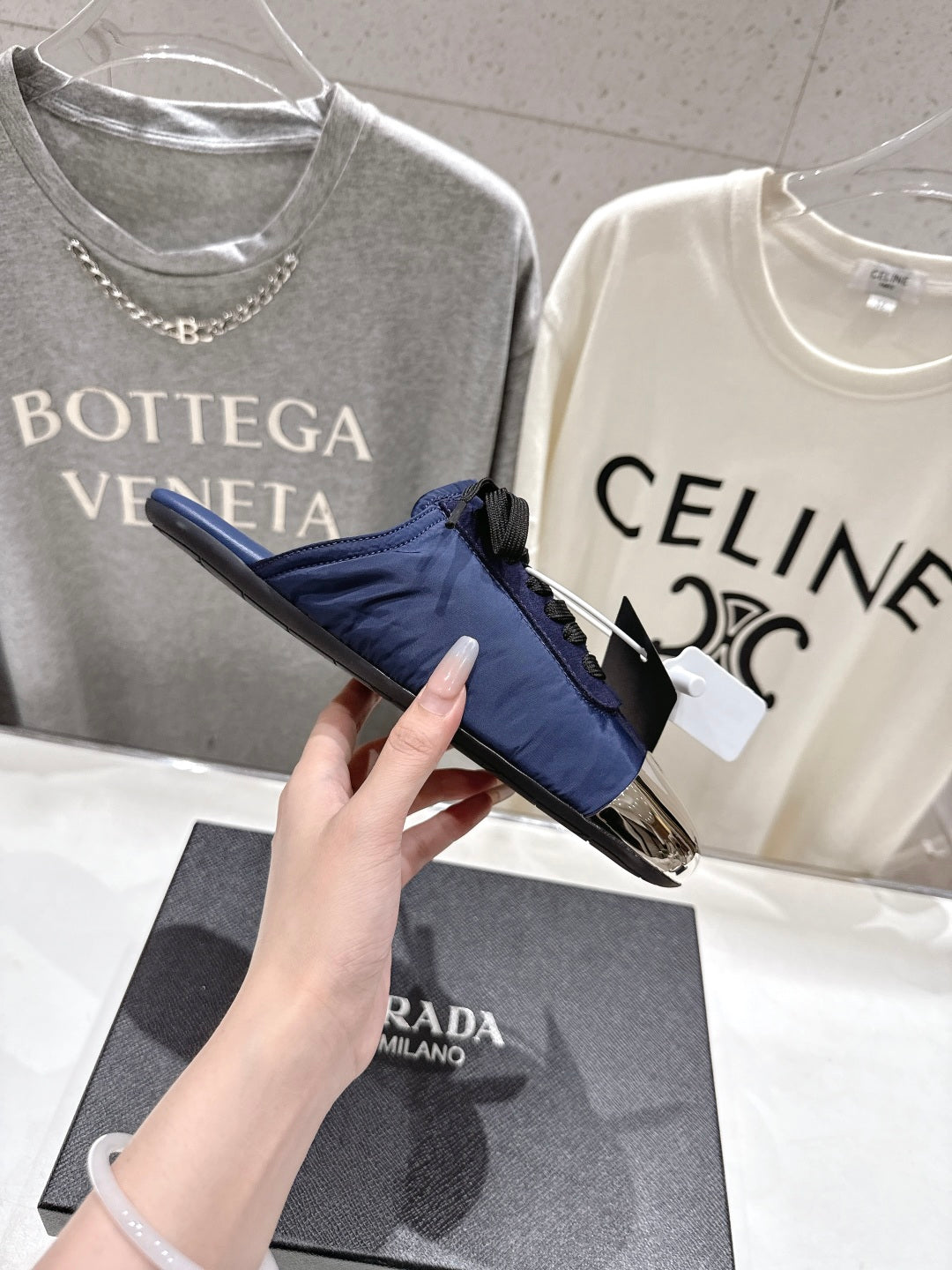PRADA 25S MULES IN DARK BLUE WITH METAL TOECAP
