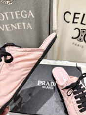 PRADA 25S MULES IN LIGHT PINK WITH METAL TOECAP