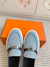 HM 25S SLIP-ON IN SKY BLUE CANVAS AND BLACK LAMBSKIN WITH SILVER HARDWARE
