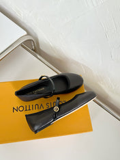 ROMY FLAT BALLERINA IN BLACK CALFSKIN