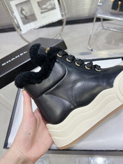 MARTIN BOOTS IN BLACK CALFSKIN AND LAMB FUR LINING