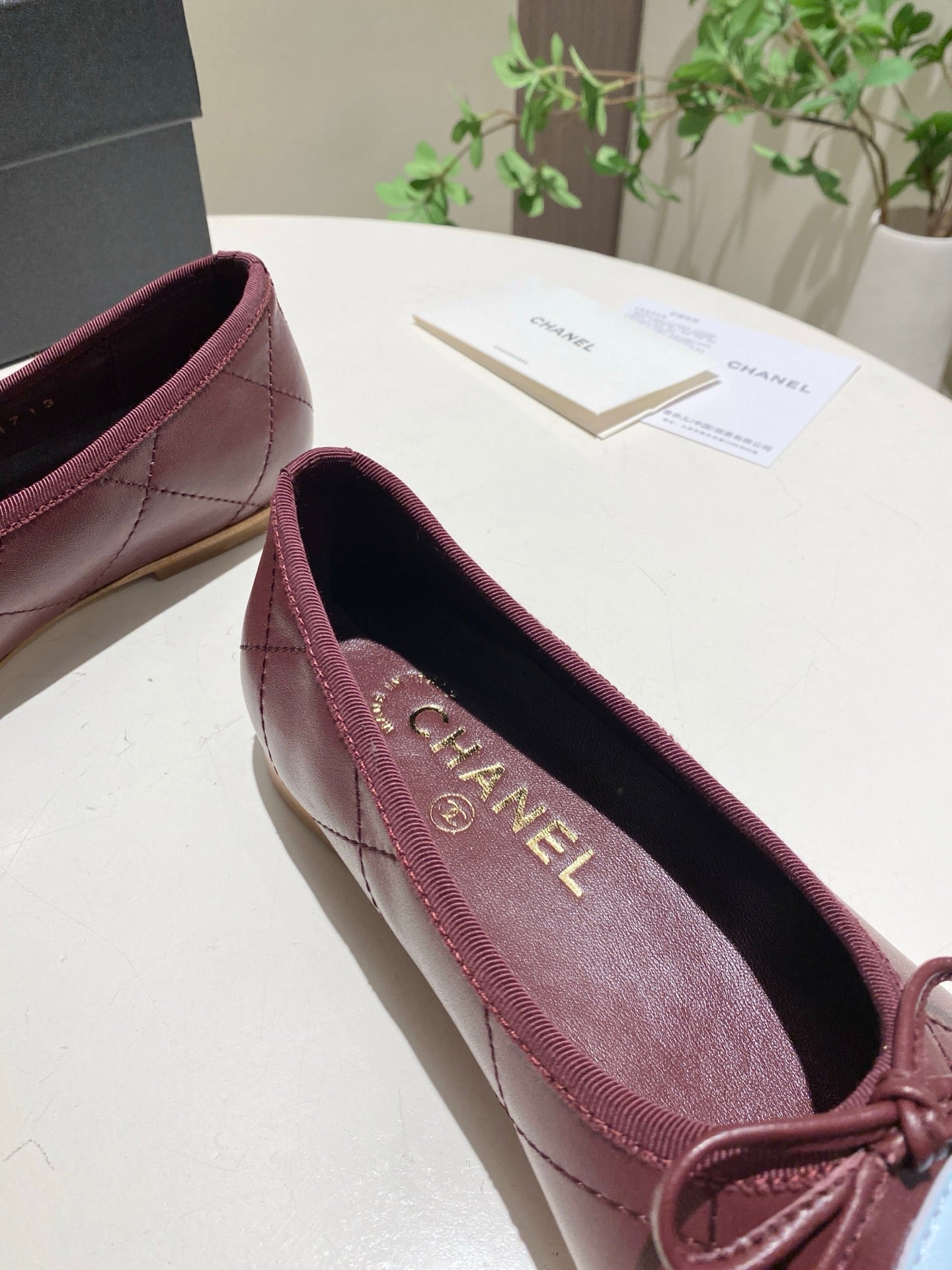 CHANEL 26S FLATS IN DARK RED LAMBSKIN WITH BOW