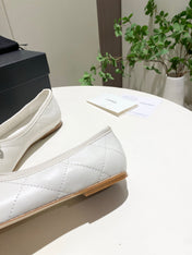 CHANEL 26S FLATS IN WHITE LAMBSKIN WITH BOW