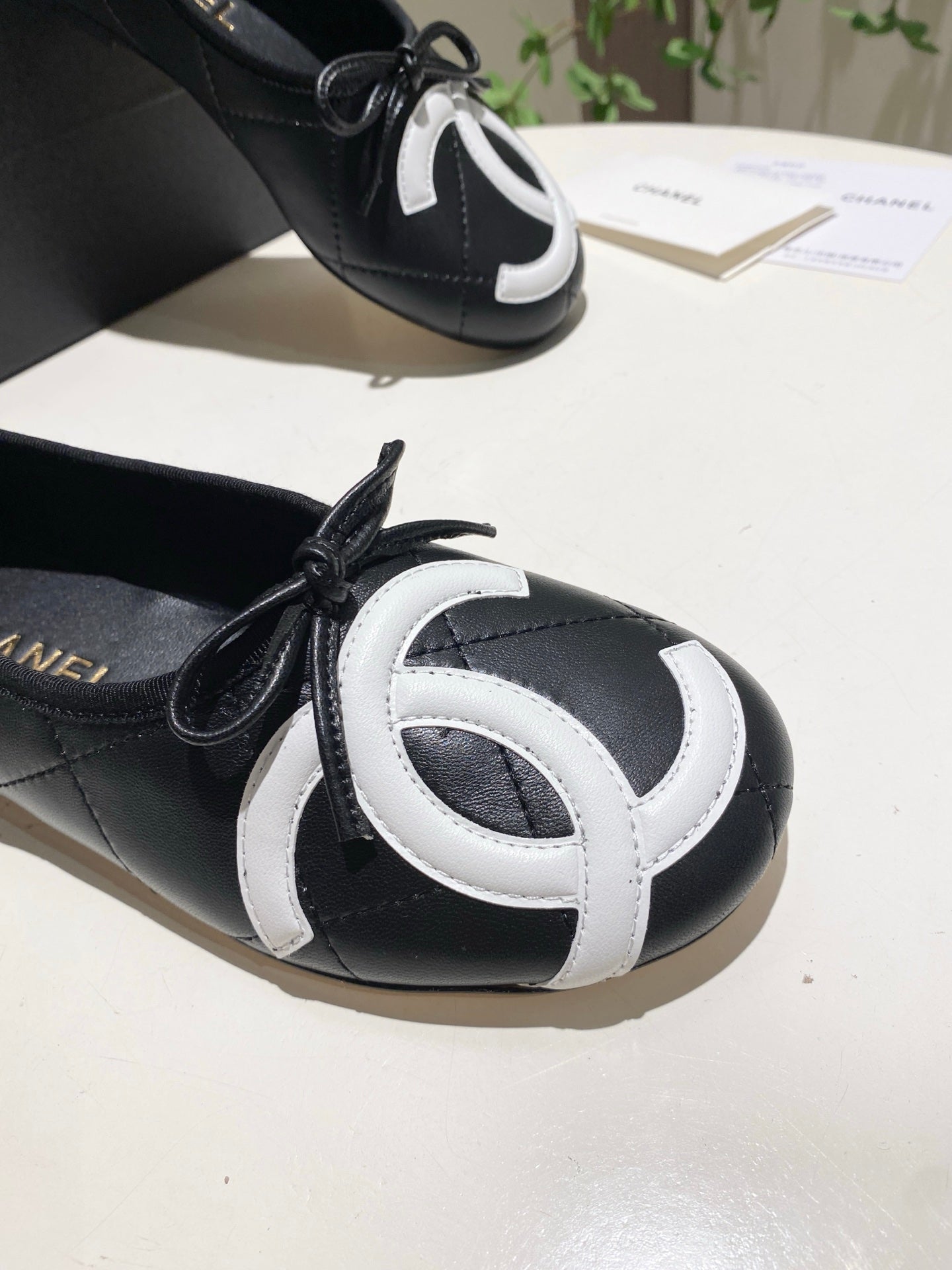 CHANEL 26S FLATS IN BLACK LAMBSKIN WITH BOW