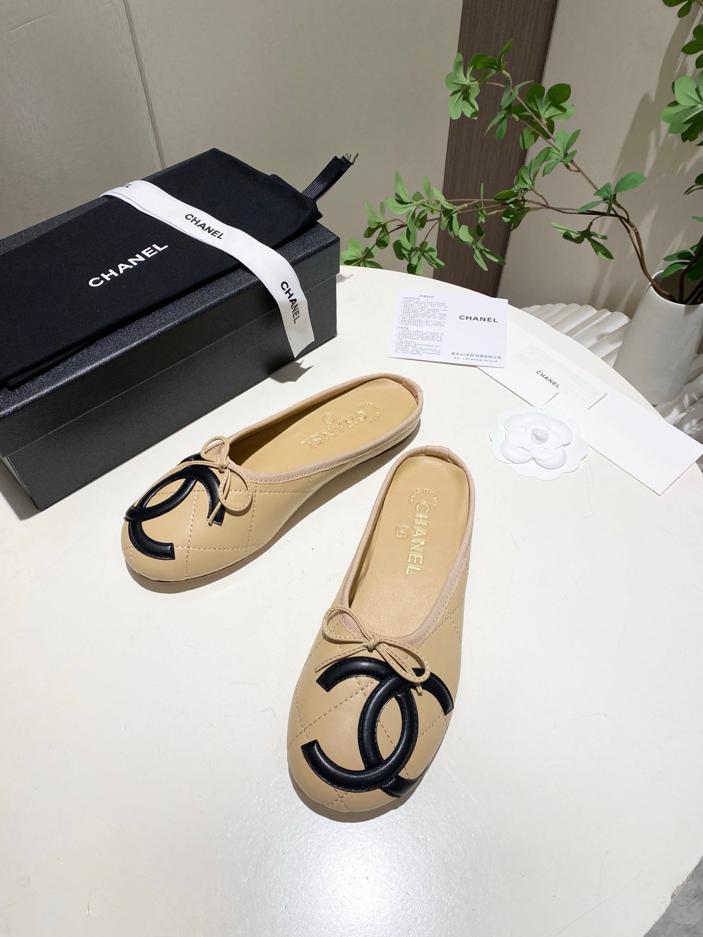 CHANEL 26S FLAT MULES IN BEIGE LAMBSKIN