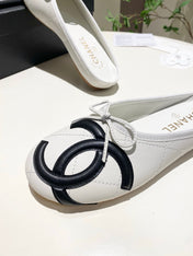 CHANEL 26S FLAT MULES IN WHITE LAMBSKIN