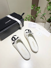 CHANEL 26S FLAT MULES IN WHITE LAMBSKIN