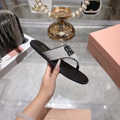 MIUMIU 26S THONG SANDALS IN WHITE CANVAS AND BLACK CALFSKIN LOGO