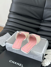 WOVEN SLIDE IN RAFFIA AND LIGHT PINK LAMBSKIN