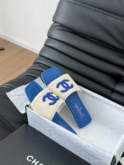 WOVEN SLIDE IN RAFFIA AND CERULEAN BLUE LAMBSKIN