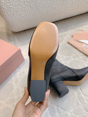 MIUMIU 26S HIGH-HEELED ANKLE BOOTS 70MM IN BLACK CALFSKIN