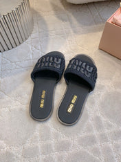 MIUMIU 26S SLIDE SANDALS IN BLACK CALFSKIN AND WOOL