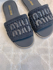 MIUMIU 26S SLIDE SANDALS IN BLACK CALFSKIN AND WOOL