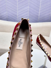 ROCKSTUD FLAT PUMP IN BERRY RED CALFSKIN