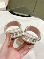 TRUMPET METALLIC MULES IN WHITE SMOOTH CALFSKIN WITH EMBELLISHED BUCKLE