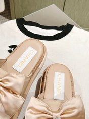 CC SLIPPERS WITH SILK BOW IN BEIGE ALMOND COWHIDE