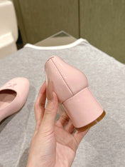 SWING HIGH PUMP 55 MM IN PALE PINK PATENT CALFSKIN