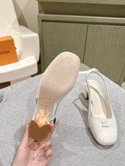 SWING SLINGBACK PUMP 55 MM IN WHITE PATENT CALFSKIN