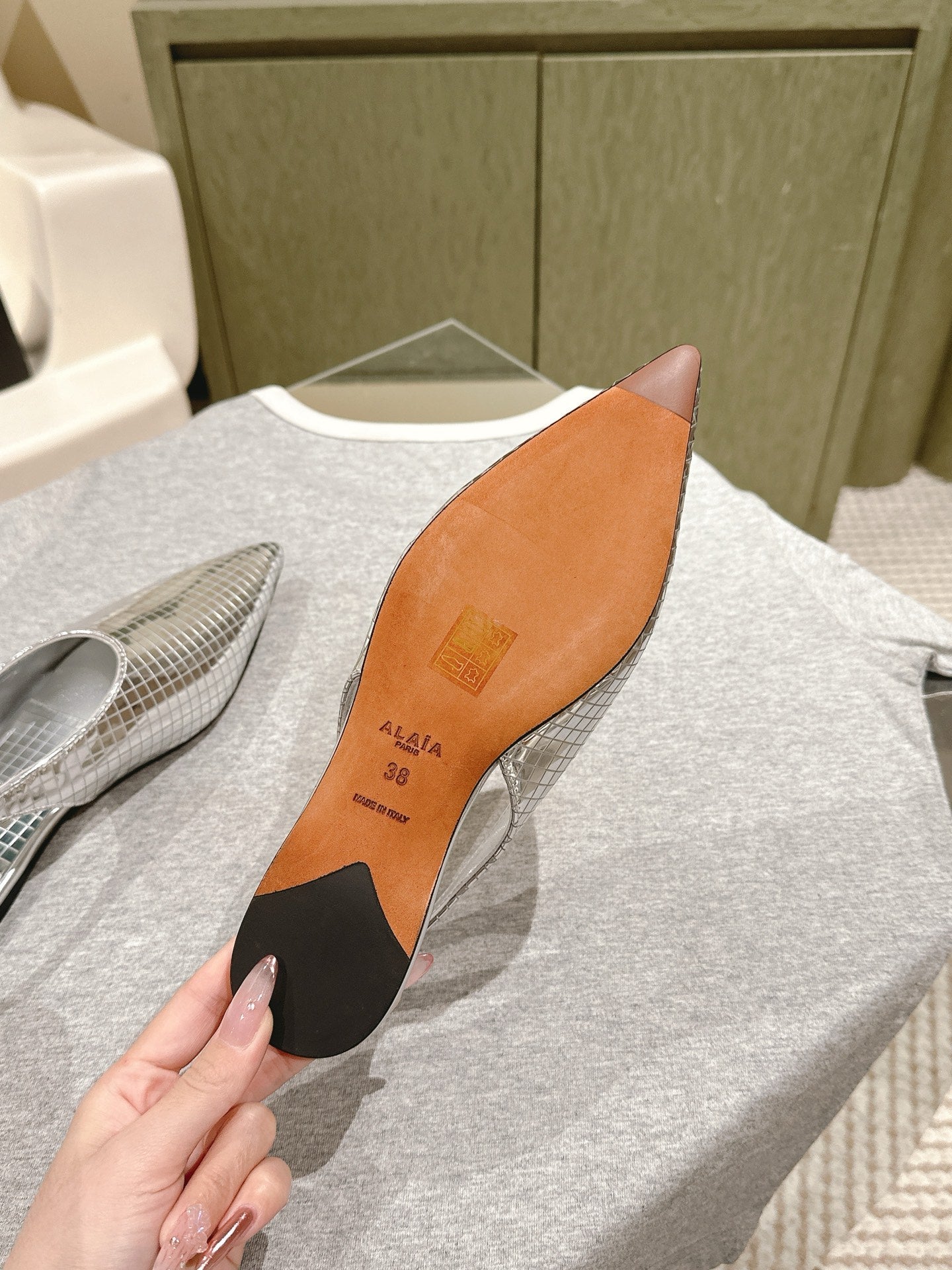 ALAIA SLINGBACK 25S IN SILVER PATENT LEATHER