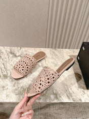 ALAIA PERFORATED SLIDE SANDALS 25S IN PINK BEIGE SUEDE