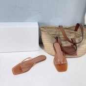 THE ROW 26S SQUARE TOE THONG SANDALS IN TRANSLUCENT BROWN PVC WITH SILVER FOOTBED