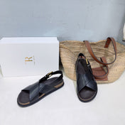 THE ROW 26S CROSS STRAP SANDALS IN BLACK CALFSKIN