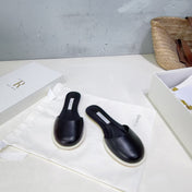 THE ROW 26S ROUND TOE MULE FLATS IN BLACK SMOOTH CALFSKIN