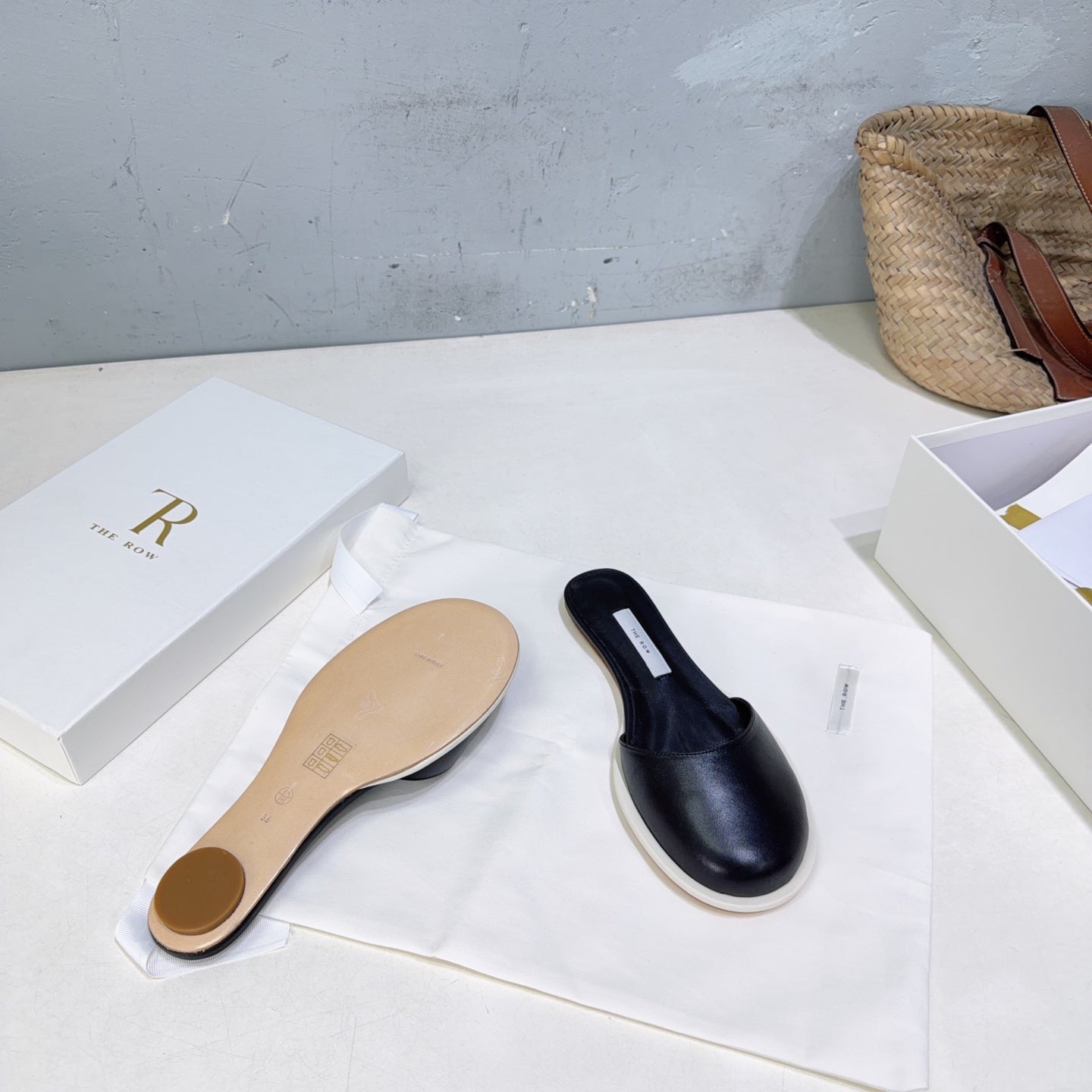 THE ROW 26S ROUND TOE MULE FLATS IN BLACK SMOOTH CALFSKIN