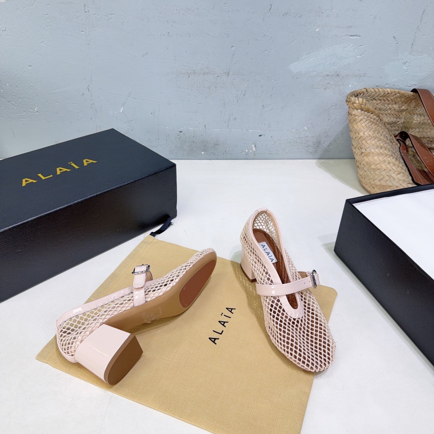 ALAIA 26S HIGH-HEEL MARY JANES 50 MM IN NUDE PINK WOVEN MESH