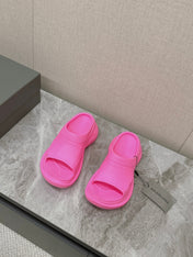 POOL CROCS SLIDE SANDAL IN BRIGHT PINK RUBBER