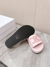 THICK-SOLED SLIDES IN LIGHT PINK SMOOTH LAMBSKIN LOGO WITH CRYSTALS