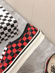 VALENTINO 25S GARAVANI X VANS SNEAKERS IN RED MIX BLACK CANVAS