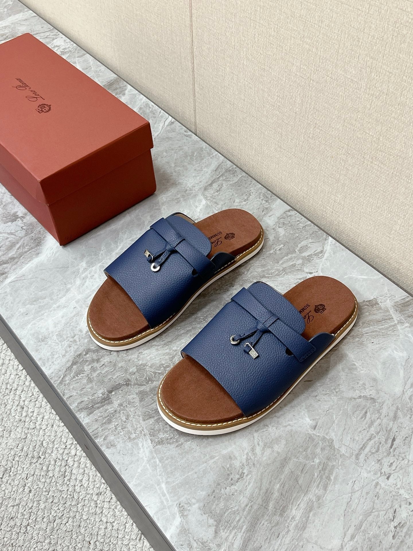 LP 26S LOCK CHARM SLIDES IN NAVY BLUE CALFSKIN SILVER HARDWARE