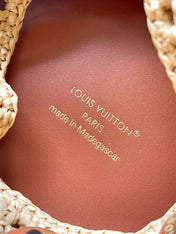 NOÉ PURSE 24 IN BEIGE CROCHETED RAFFIA AND BROWN CALFSKIN TRIM