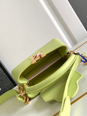 CAPUCINES MINI 21 IN PEAR GREEN TAURILLON GOLD HARDWARE