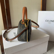 HALF MOON CASE 18 IN BLACK TRIOMPHE CANVAS AND BRONZE BROWN CALFSKIN