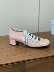 LACE-UP HIGH SHOES IN PALE PINK GLOSSY CALFSKIN