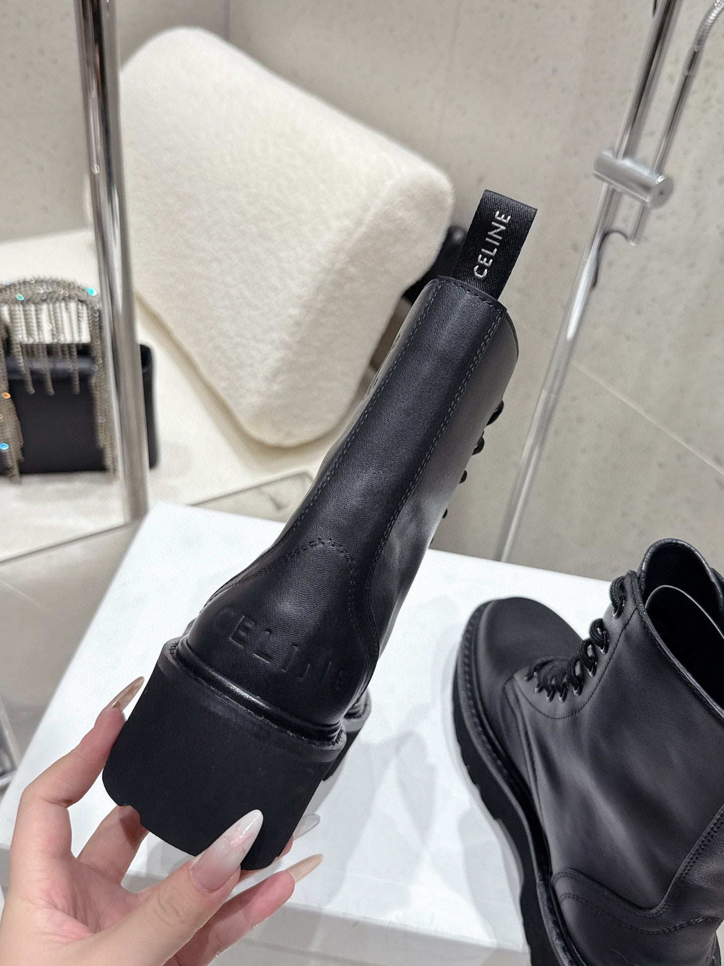 CELINE 26S CHUNKY-SOLE COMBAT BOOTS IN BLACK CALFSKIN