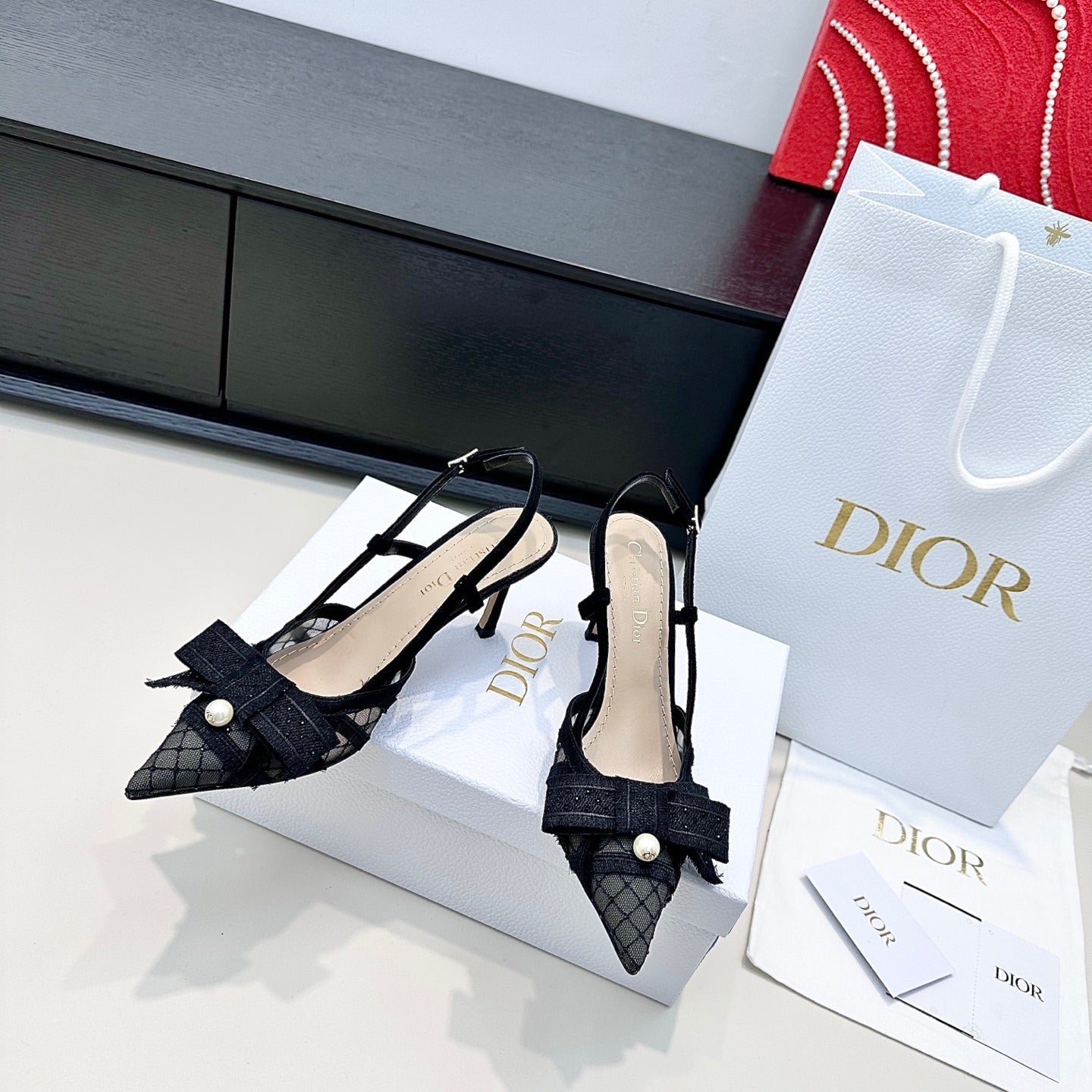 DIOR 26S POINTED TOE HEELED SANDALS 85MM IN BLACK FABRIC WITH PEARL BOW
