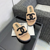 CHANEL 26S SLIDE SANDALS IN BLACK AND BEIGE SHEARLING OPEN TOE