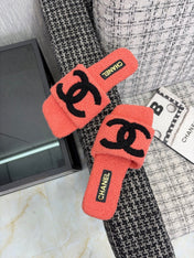 CHANEL 26S SLIDE SANDALS IN BLACK AND CORAL PINK SHEARLING SQUARE TOE