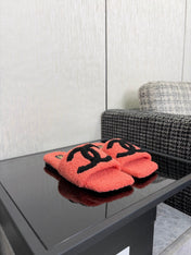 CHANEL 26S SLIDE SANDALS IN BLACK AND CORAL PINK SHEARLING SQUARE TOE