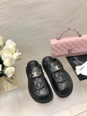 CC TURNLOCK FLAP MULES BLACK LAMBSKIN